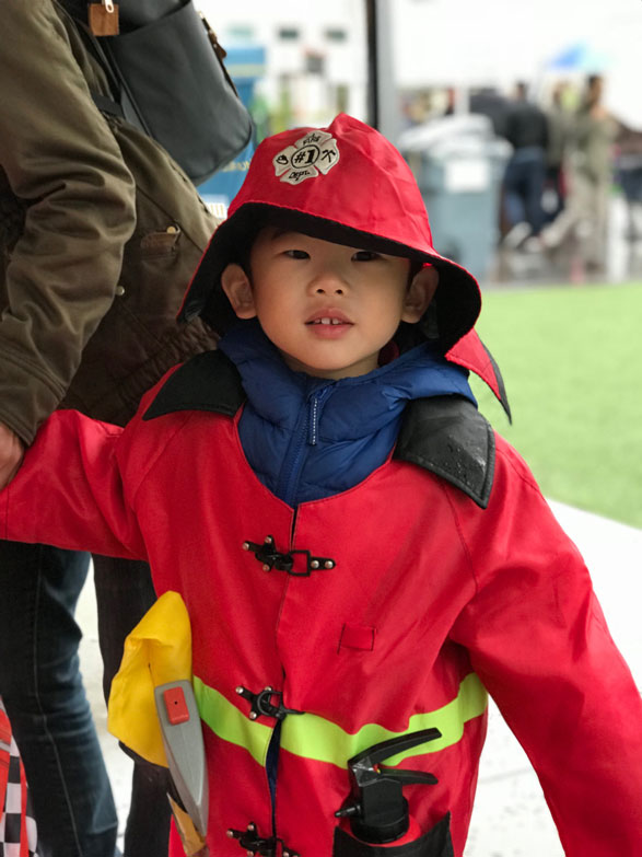 Monster mash little boy in fireman costume